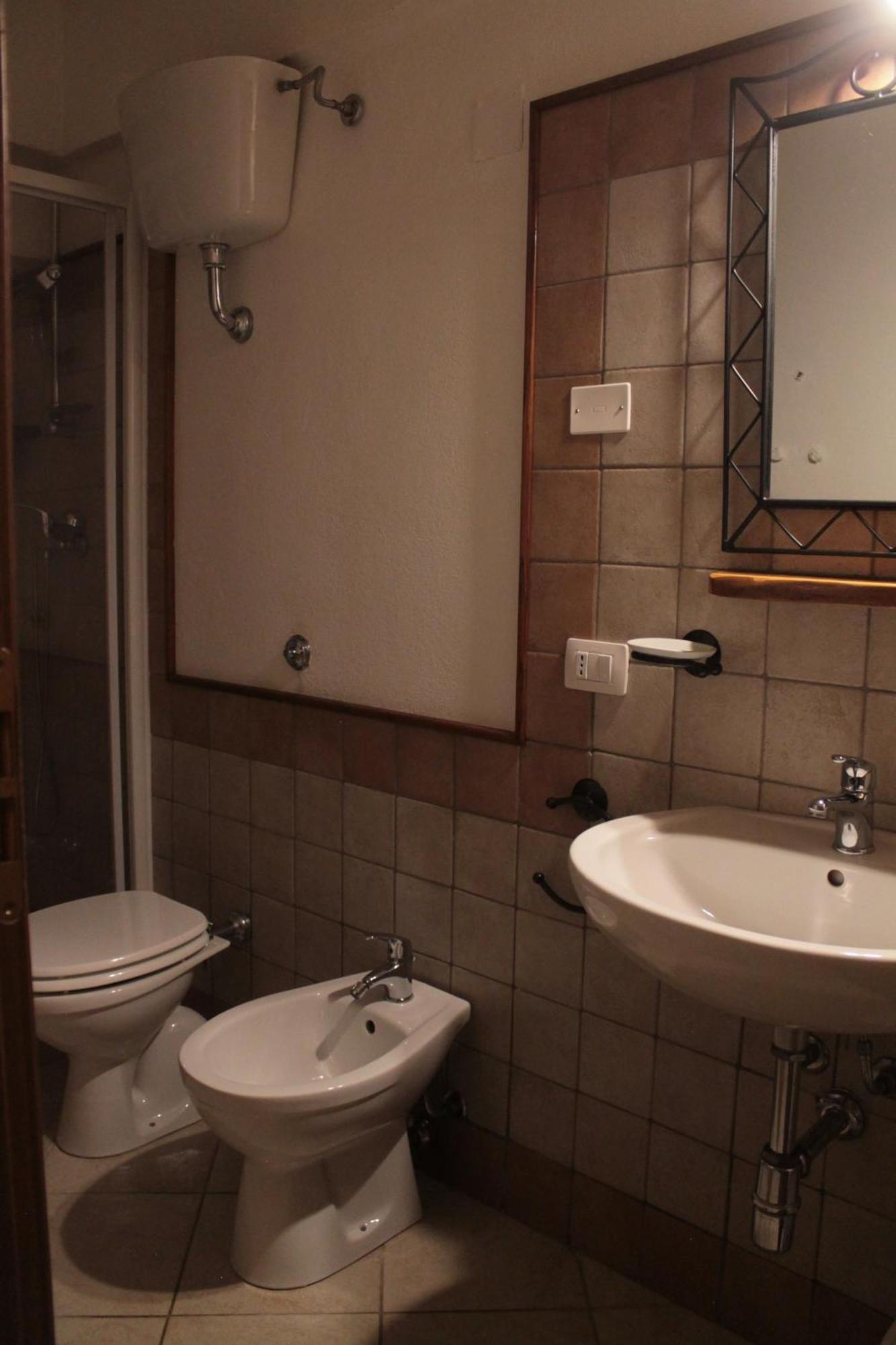 Hotel S'Alzolitta Magomadas Habitación foto