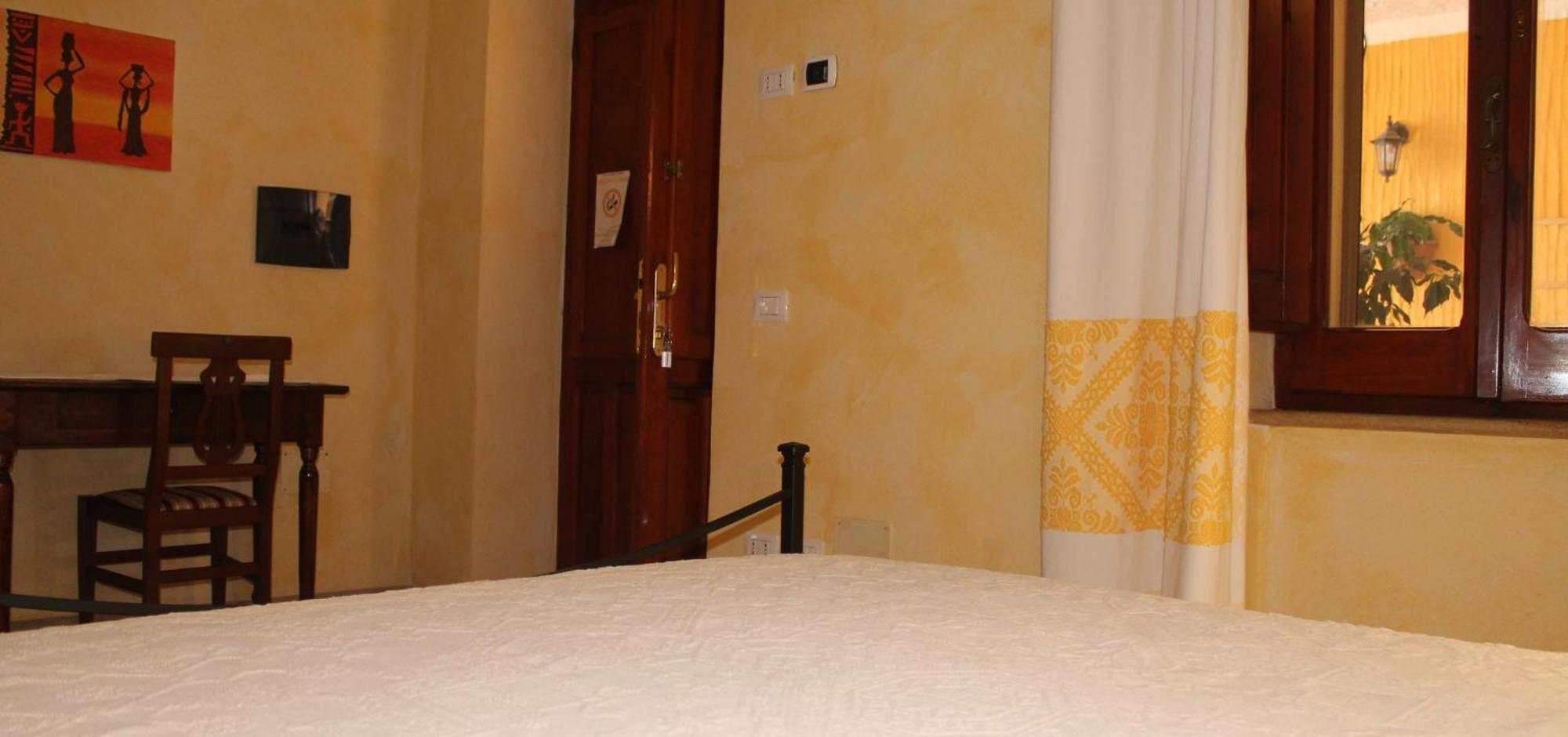 Hotel S'Alzolitta Magomadas Habitación foto